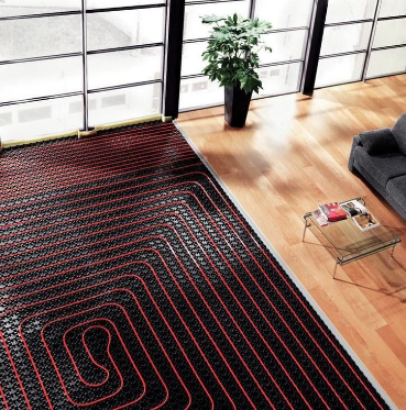 A descriptive photo showing the installation pattern for in floor heat radiating tubes. 