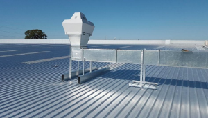An installed ventilation system on top of a factory metal roof in Volusia county, Florida.